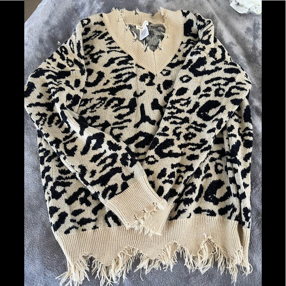 Frayed sweater